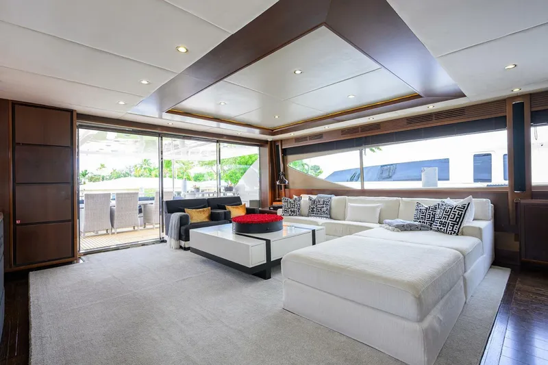 Slide: The Image of Luxurious interior of 2009 Princess 95 yacht with modern white seating and large windows. - 38