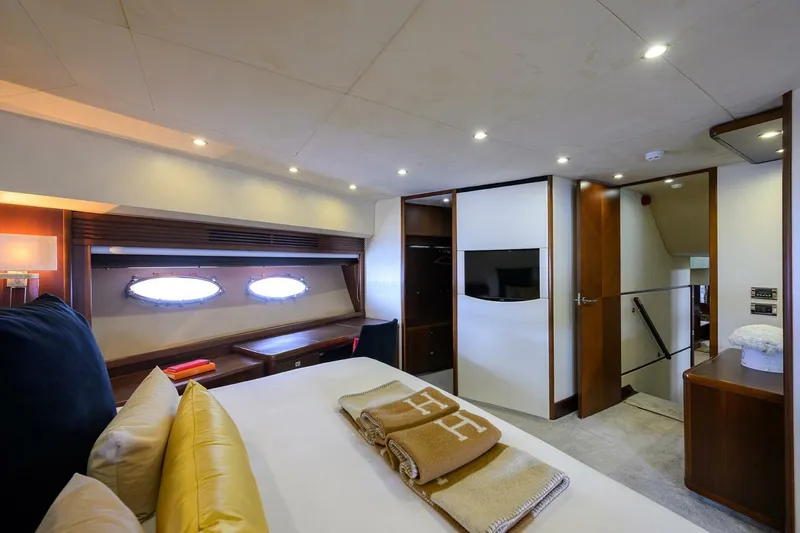 Slide: The Image of Luxurious cabin interior of 2009 Princess 95 yacht with modern amenities and elegant design. - 43