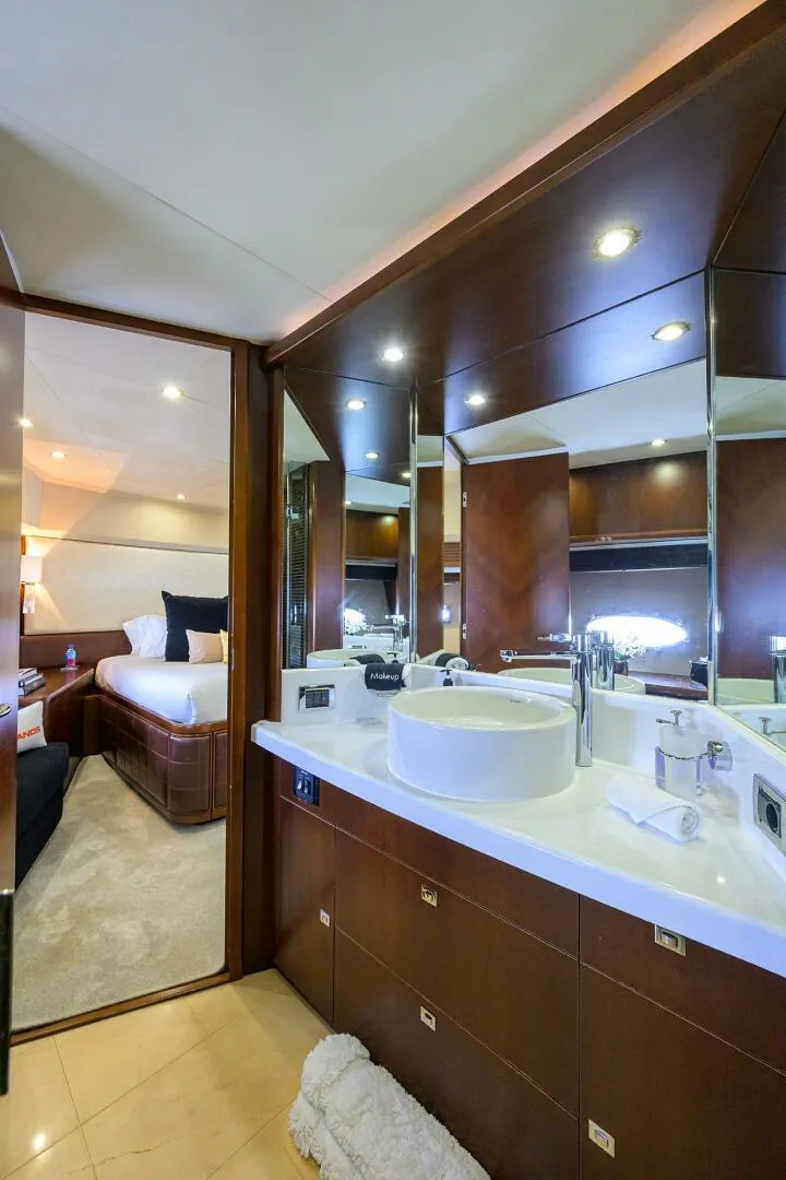 Slide: The Image of Luxurious bathroom interior on a 2009 Princess 95 yacht, featuring modern fixtures and elegant design. - 48