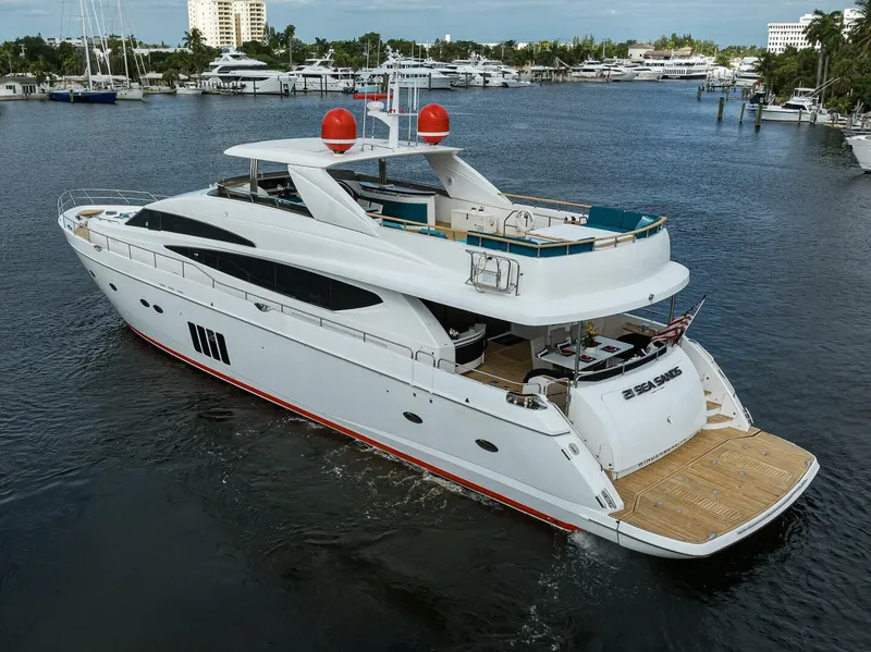 Slide: The Image of Luxurious 2009 Princess 95 yacht cruising in a marina, showcasing elegant design and spacious decks. - 5