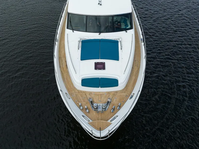 Slide: The Image of Aerial view of 2009 Princess 95 yacht with teak deck on water. - 9