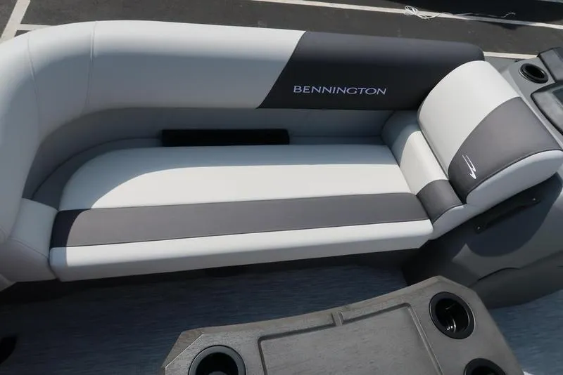 Slide: The Image of 2025 Bennington S Quad Bench 22 SSR boat seating, gray and white upholstery. - 11