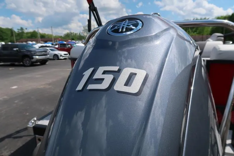Slide: The Image of 2025 Bennington S Quad Bench 22 SSR boat engine with "150" horsepower marking. - 14