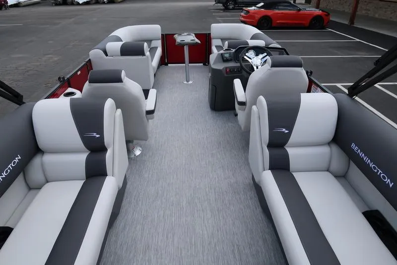 Slide: The Image of 2025 Bennington S Quad Bench 22 SSR interior with luxurious seating and modern design. - 20
