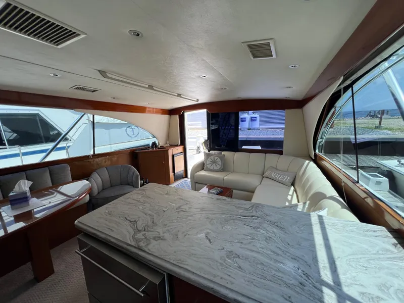 Slide: The Image of Luxurious interior of a 1998 Ocean Yachts 45 Super Sport with elegant seating and marble countertop. - 3