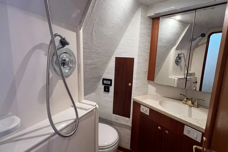 Slide: The Image of Bathroom interior of 1998 Ocean Yachts 45 Super Sport with shower and vanity. - 5