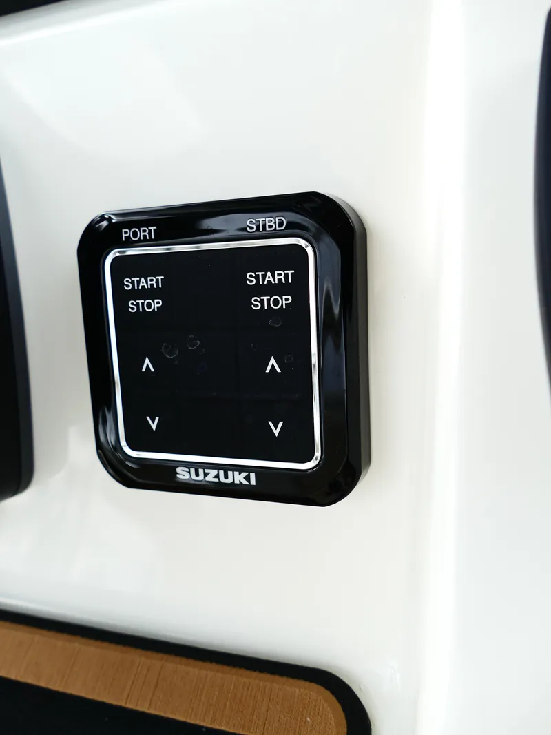 Slide: The Image of Suzuki control panel on 2026 Bulls Bay 255CC boat dashboard. - 26