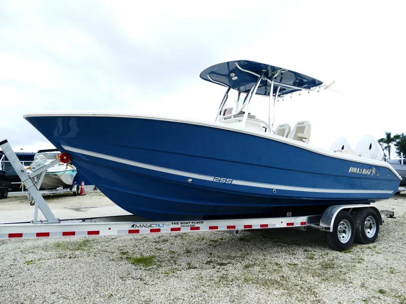 Slide: The Image of 2026 Bulls Bay 255CC blue boat on trailer, side view. - 3