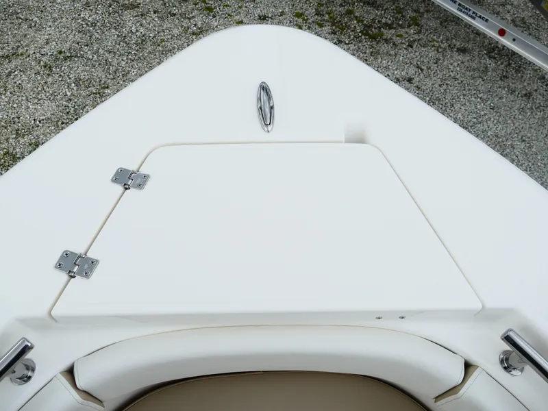 Slide: The Image of 2026 Bulls Bay 255CC boat deck with storage compartment and stainless steel hardware. - 42