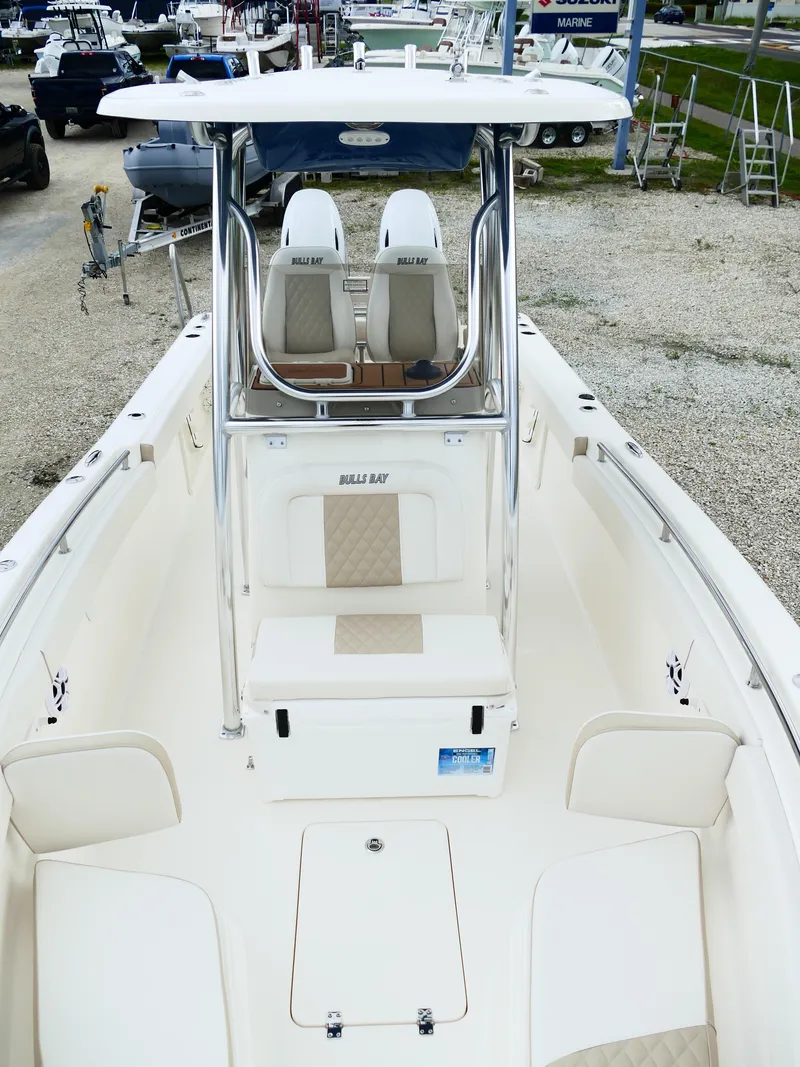 Slide: The Image of 2026 Bulls Bay 255CC boat interior with dual seats and center console. - 45