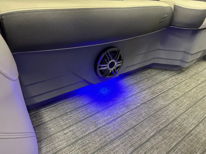 Slide: The Image of 2022 Starcraft SLS 3 interior with blue LED lighting and speaker detail. - 17
