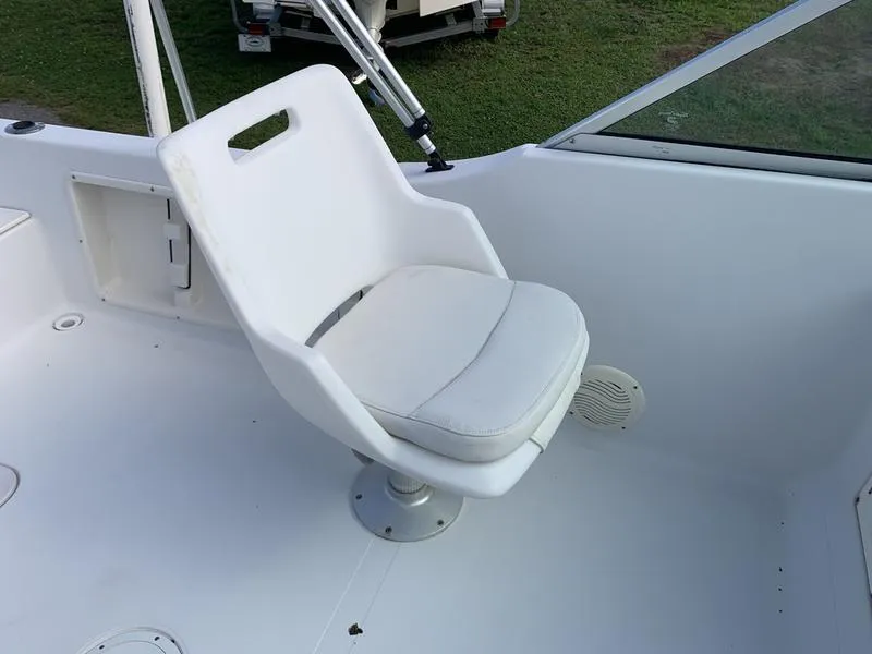 Slide: The Image of White swivel seat on 2005 Sailfish 198 DC boat deck. - 17