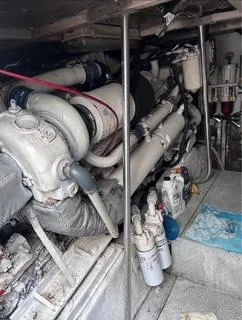 Slide: The Image of Engine room of 1986 Egg Harbor 60 Sportfisherman with visible machinery and equipment. - 6