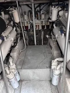 Slide: The Image of Engine room of 1986 Egg Harbor 60 Sportfisherman with visible machinery and components. - 7