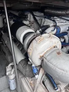 Slide: The Image of Engine compartment of a 1986 Egg Harbor 60 Sportfisherman boat. - 9