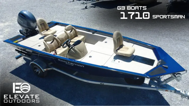 Slide: The Image of 2025 G3 Sportsman 1710 boat on trailer, featuring beige seats and blue exterior. - 0