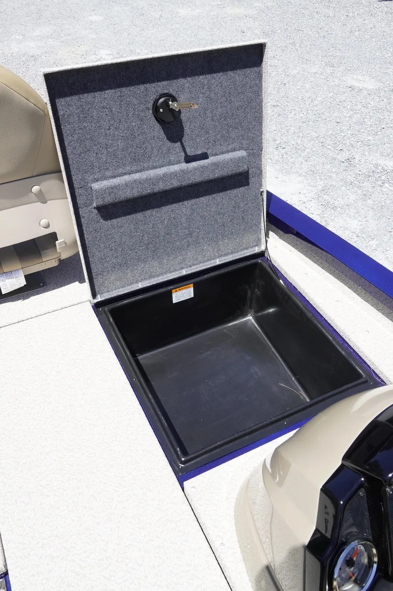 Slide: The Image of 2025 G3 Sportsman 1710 boat storage compartment with open lid, showcasing interior space. - 10