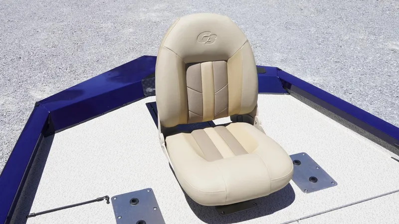 Slide: The Image of 2025 G3 Sportsman 1710 boat seat, beige upholstery, on deck. - 13