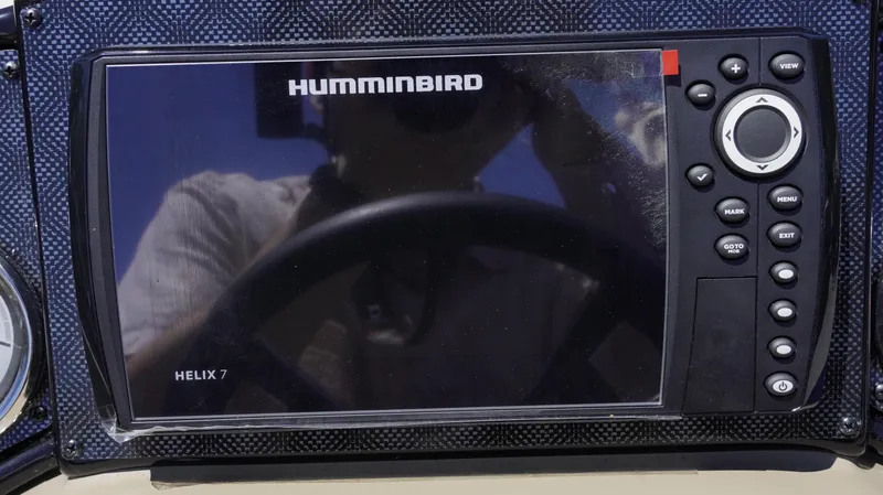 Slide: The Image of Humminbird Helix 7 fish finder on G3 Sportsman 1710, 2025 model dashboard. - 20