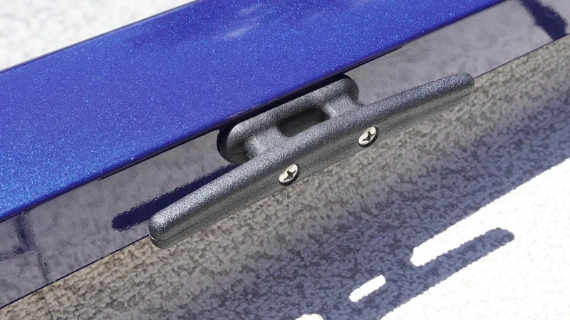 Slide: The Image of 2025 G3 Sportsman 1710 boat cleat on blue surface, close-up view. - 23