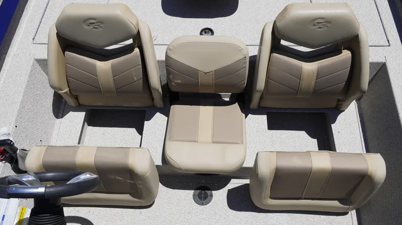 Slide: The Image of 2025 G3 Sportsman 1710 boat interior with beige seating arrangement. - 35