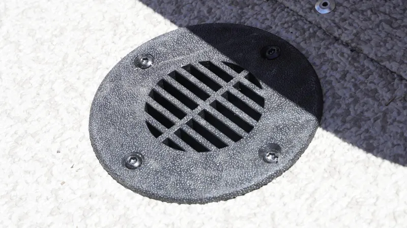Slide: The Image of Round vent on 2025 G3 Sportsman 1710 boat floor, secured with screws. - 38