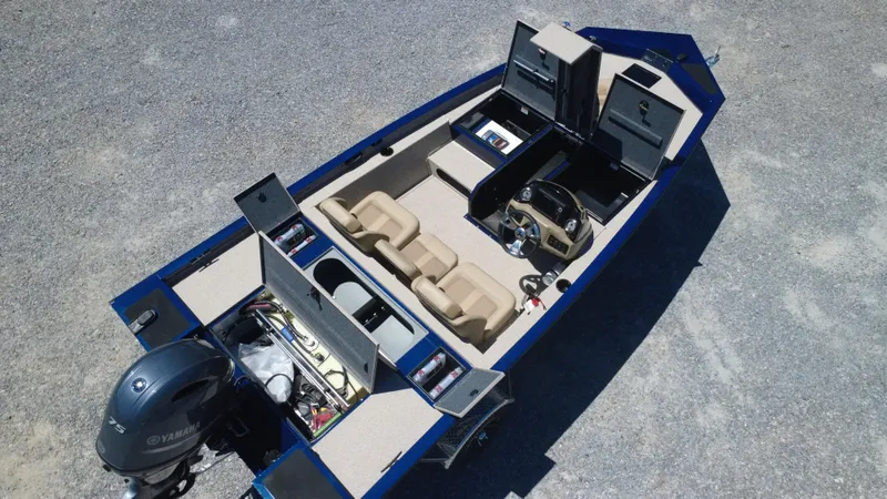Slide: The Image of 2025 G3 Sportsman 1710 boat, aerial view, showcasing interior layout and Yamaha motor. - 4