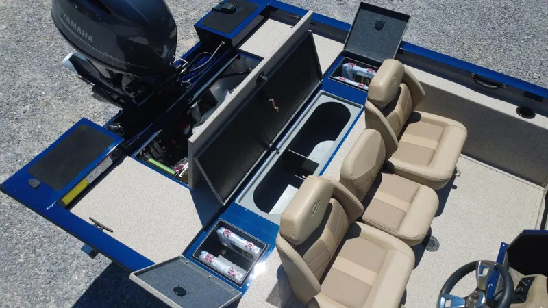 Slide: The Image of 2025 G3 Sportsman 1710 boat interior with seating and storage compartments. - 40