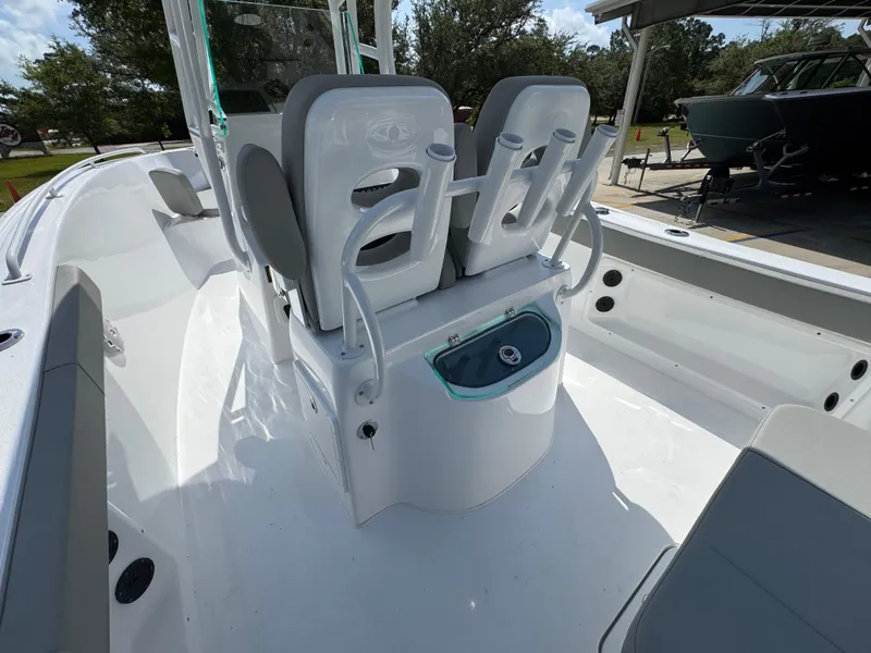 Slide: The Image of 2025 Cape Horn 22 OS boat interior with dual seats and storage compartment. - 36