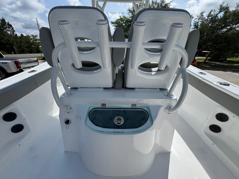 Slide: The Image of 2025 Cape Horn 22 OS boat interior with dual seats and rod holders. - 37
