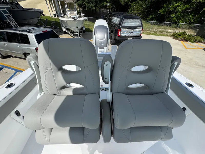 Slide: The Image of 2025 Cape Horn 22 OS boat with dual gray cushioned seats. - 35
