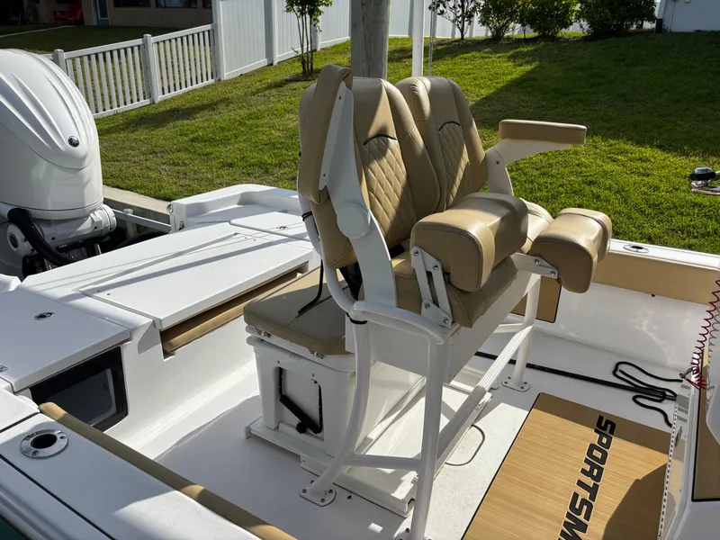 Slide: The Image of 2024 Sportsman Masters 247OE Bay Boat with tan seating and white deck. - 4