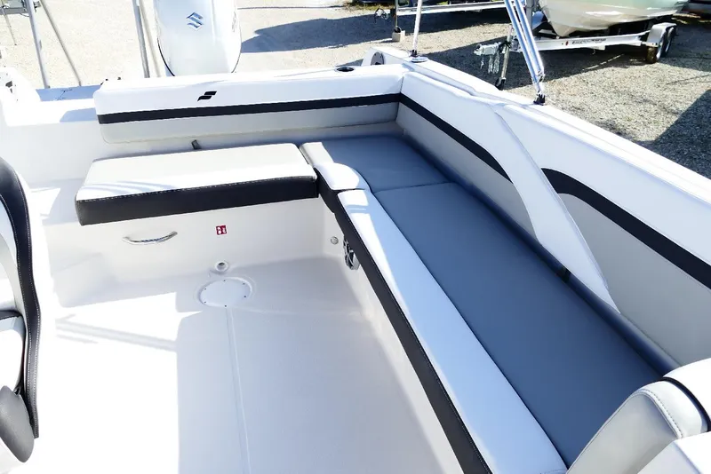 Slide: The Image of 2026 Starcraft SVX 211 OB boat interior with sleek seating and modern design. - 12