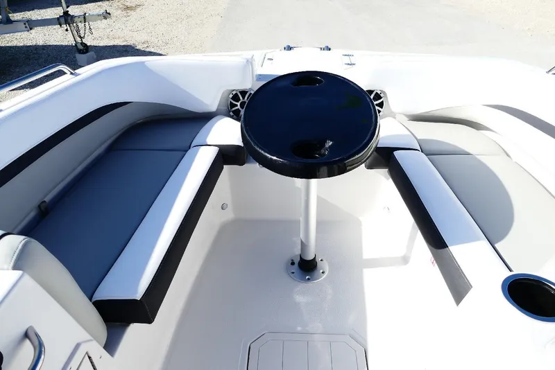 Slide: The Image of 2026 Starcraft SVX 211 OB boat interior with seating and table. - 14