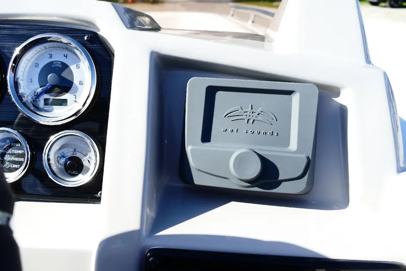 Slide: The Image of Dashboard of 2026 Starcraft SVX 211 OB boat with gauges and Wet Sounds audio system. - 15