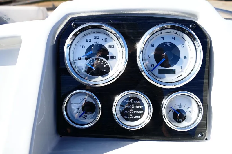 Slide: The Image of Dashboard gauges of 2026 Starcraft SVX 211 OB boat, displaying speed, RPM, and fuel levels. - 17