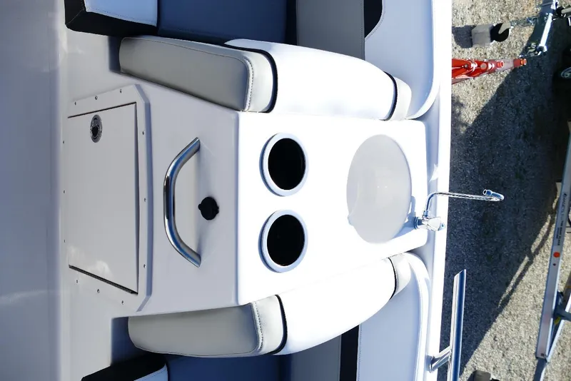 Slide: The Image of 2026 Starcraft SVX 211 OB boat interior with cup holders and faucet. - 21