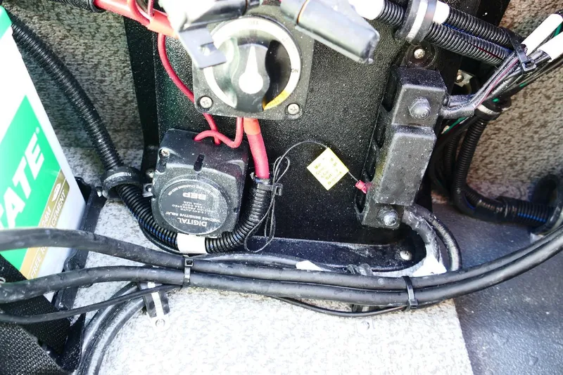 Slide: The Image of Electrical components and wiring inside a 2026 Starcraft SVX 211 OB boat. - 38