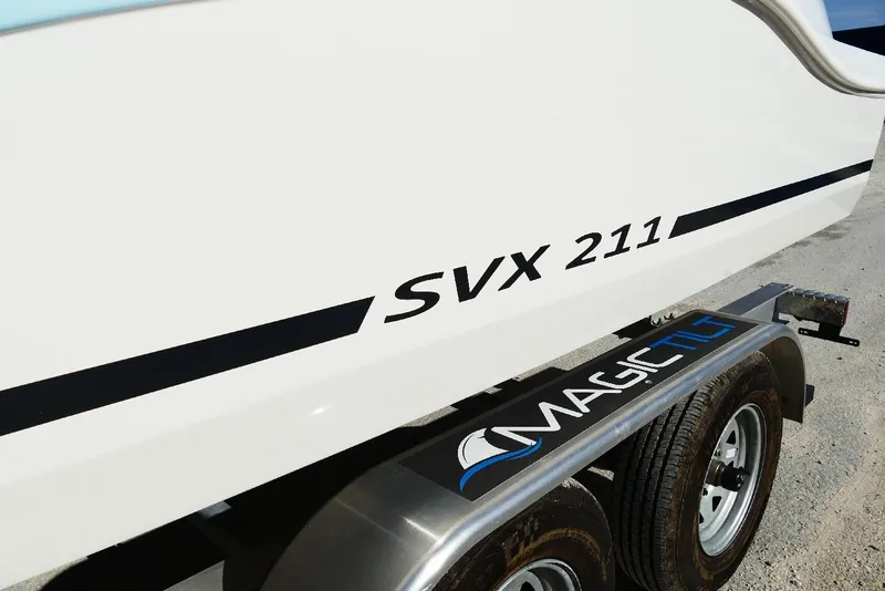 Slide: The Image of 2026 Starcraft SVX 211 OB boat on Magic Tilt trailer, side view. - 7