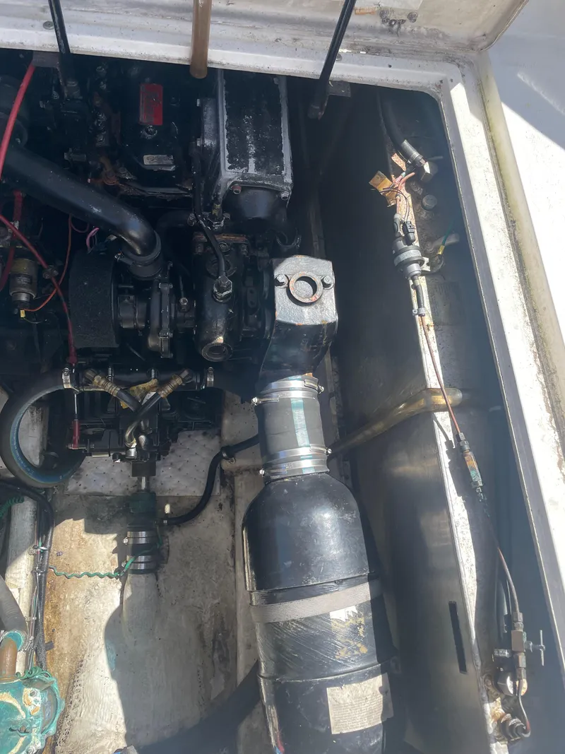 Slide: The Image of Interior of 1993 Bayliner 3288 Motoryacht with wood accents and seating area. - 10