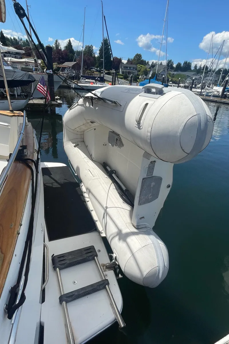 Slide: The Image of Bathroom interior of a 1993 Bayliner 3288 boat with sink, toilet, and mirror. - 11