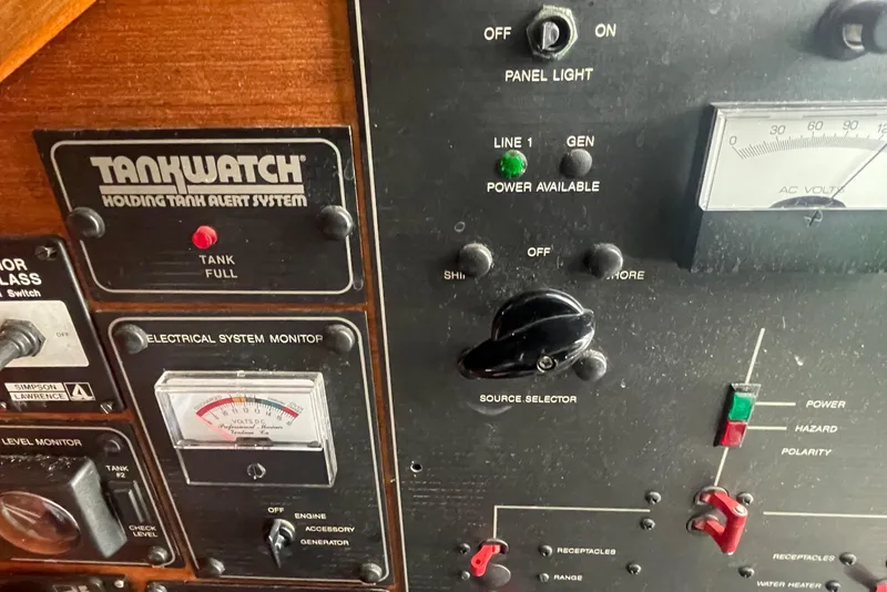 Slide: The Image of Bayliner 3288 Motoryacht 1993 docked in a marina under a cloudy sky. - 15