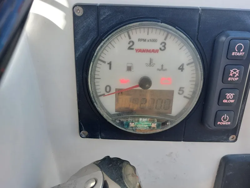 Slide: The Image of Yanmar tachometer on 2020 Beneteau Oceanis 30.1 sailboat dashboard. - 14