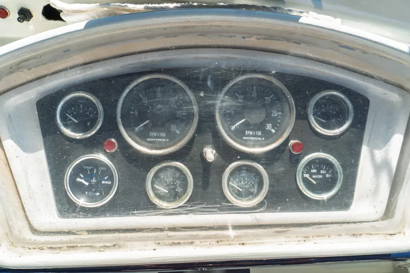 Slide: The Image of Instrument panel of a 1982 Albin 43 boat with various gauges and dials. - 27