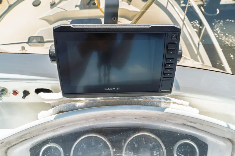 Slide: The Image of Garmin navigation system on 1982 Albin 43 yacht dashboard, with gauges visible. - 28