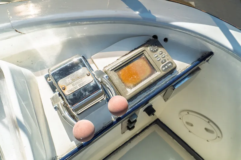 Slide: The Image of 1982 Albin 43 boat controls with marine engine control and navigation device. - 29