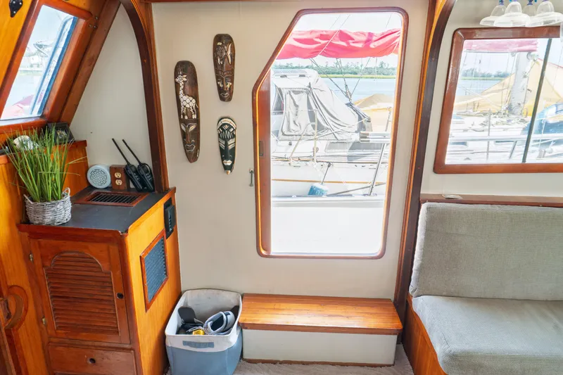 Slide: The Image of Interior of 1982 Albin 43 boat with wooden decor and nautical accessories. - 31