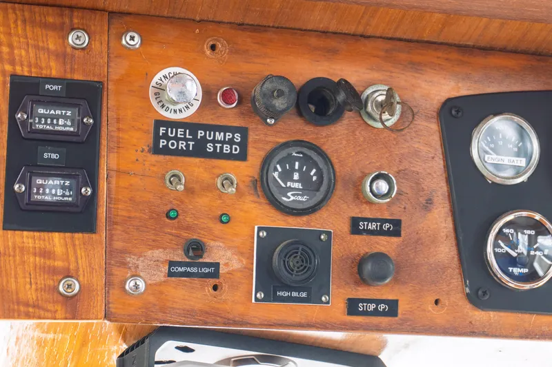 Slide: The Image of Control panel of a 1982 Albin 43 boat with gauges and switches. - 47