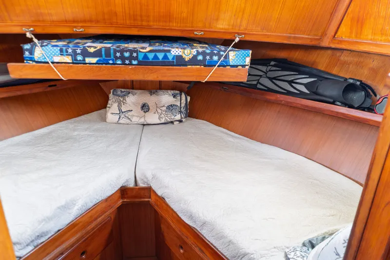 Slide: The Image of Cozy cabin interior of 1982 Albin 43 yacht with twin beds and nautical decor. - 67