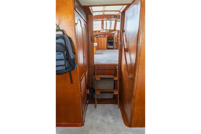 Slide: The Image of Interior of 1982 Albin 43 yacht with wooden stairs and cabinetry. - 77
